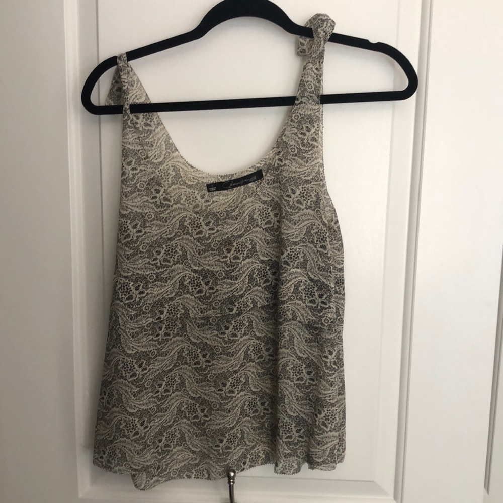 Sheer patterned top with ties at shoulders